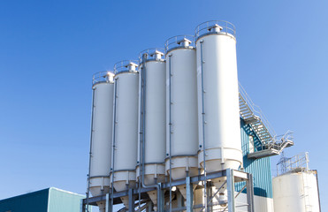 large concrete containers an an industrial premises