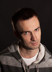 Handsome man portrait on graffiti grunge wall