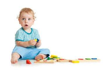 happy kid playing toys