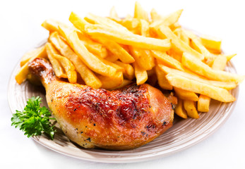 roasted chicken leg with fries potato