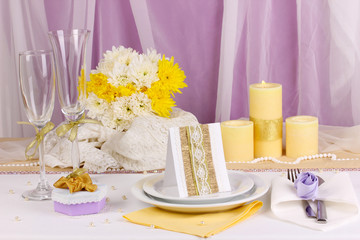 Serving fabulous wedding table in purple and yellow color