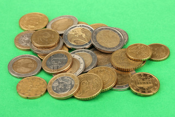 euro coins isolated on color background