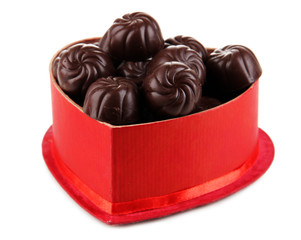Chocolate candies in gift box, isolated on white
