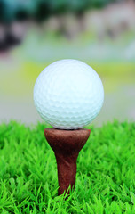 Golf ball on grass outdoor close up