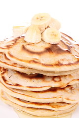Pancakes with bananas and syrop