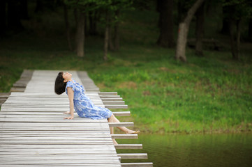 Fototapeta premium Relaxing Pregnant Woman