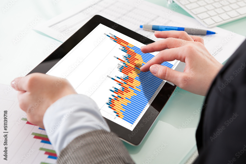 Poster close-up of hands holding digital tablet