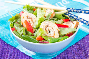 Snack with lettuce, rucola, vegetables and egg roll
