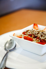 Oatmeal with Nuts Berries and Spoon