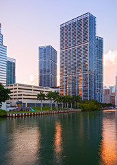 Fototapeta premium Miami Florida, Brickell and downtown financial buildings over miami River on a beautiful summer day before sunset