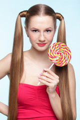 Young woman with lollipop