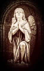 Vintage image of an angel praying