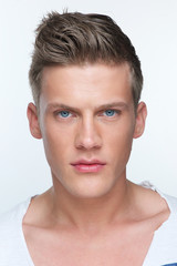 Naklejka premium Portrait of a Handsome Young Man