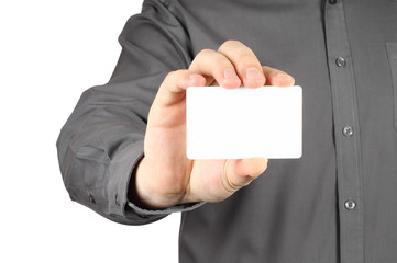 Businessman with white card on white background.