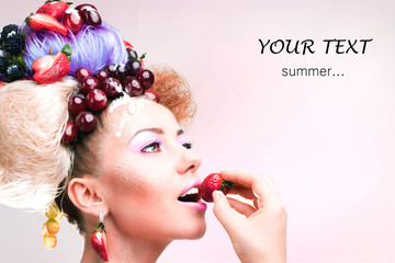 A woman with a strawberry