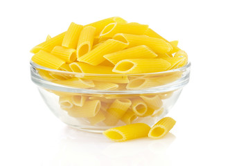 raw pasta in bowl on white