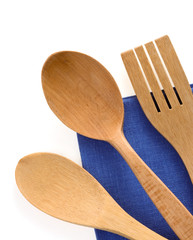 wood utensils at table napkins