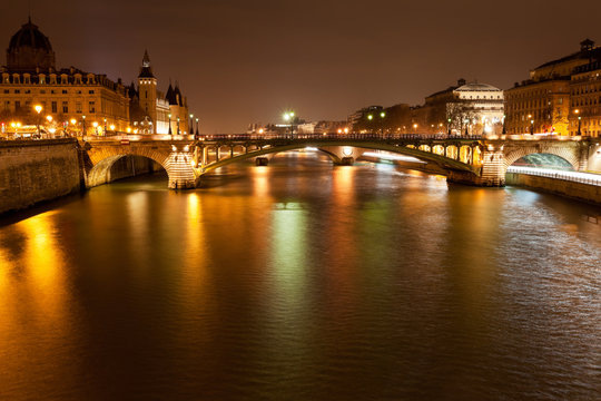 Fototapeta night panorama of Seine river in Paris