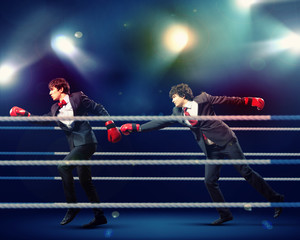Fototapeta na wymiar Dwóch młodych biznesmen boks