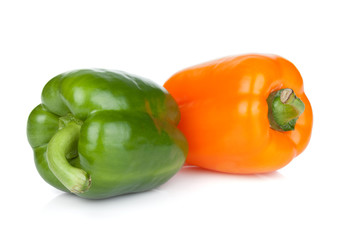 Obraz na płótnie Canvas Orange and green bell peppers