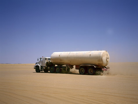 Truck driving through the Arab desert