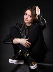 Naklejka premium Beautiful woman portrait in rock style
