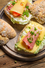Breakfast with fresh sandwiches made of cheese and ham