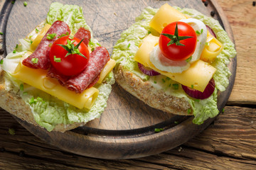 Sandwich with tomato cocktail cheese and lettuce