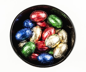 Easter chocolate eggs in a black bowl