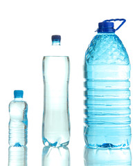 Different water bottles isolated on white