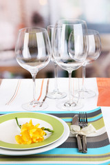 Table setting with glasses for different drinks