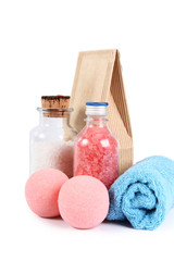 Obraz na płótnie Canvas Koncepcja Spa z butelki kolorową sól do kąpieli i niebieski ręcznik