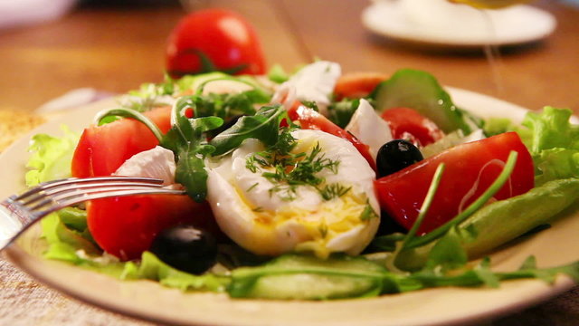 French national meal : Poached egg with salad with lemon juice