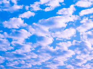 blue sky fluffy clouds