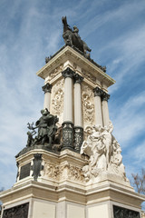 Fototapeta na wymiar Madrid - Monument of Alfonso XII in Buen Retiro park