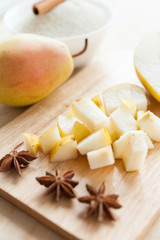 Fototapeta na wymiar slices of ripe yellow pears on the board