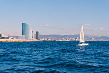 Sailing in Barcelona with the city in the background