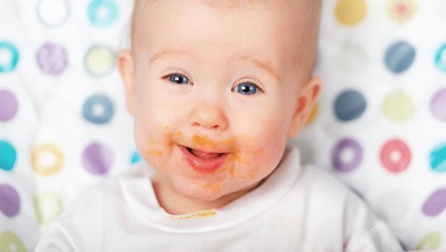 funny baby eating dirty grimy