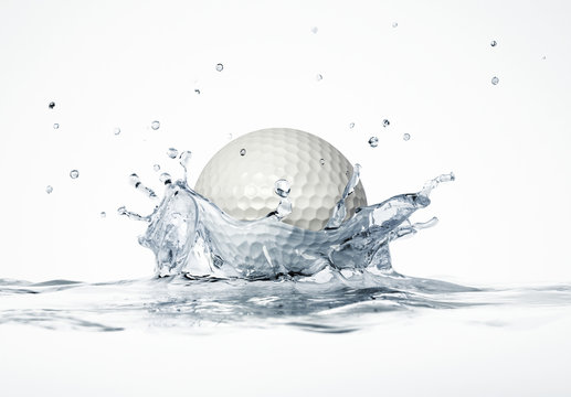 White golf ball splashing into water, forming a crown splash.