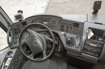 Modern bus dashboard and front seats view