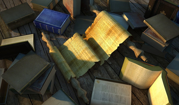 Ancient papyr surrounded by several very old books on wooden flo