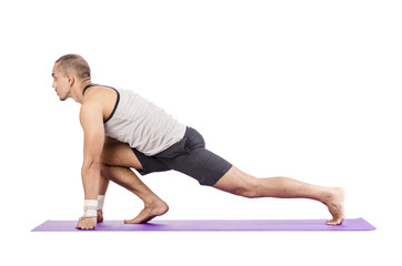 Obraz premium Man doing exercises on white