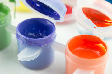 Gouache paint isolated on white