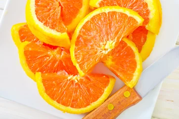 Fotobehang Plakjes fruit Oranje