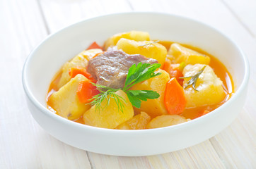 potato with sauce and meat