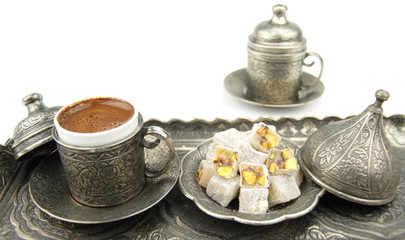 Turkish coffee and turkish delight with traditional cup and tray