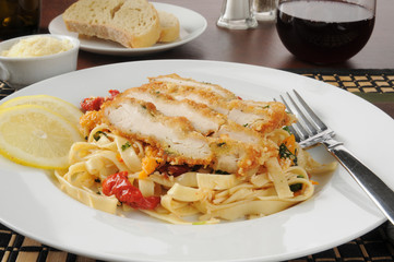 Chicken scalloppini on fettuccine