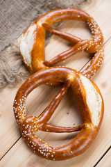 Vertical shot of german pretzels on wooden boards