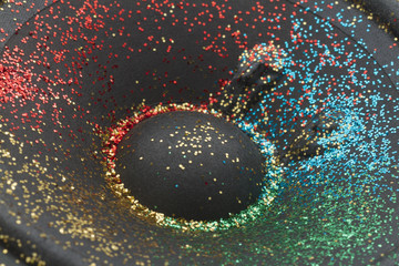 glitter on loudspeaker