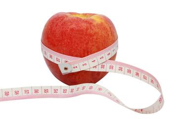 diet concept of red apple with measure tape